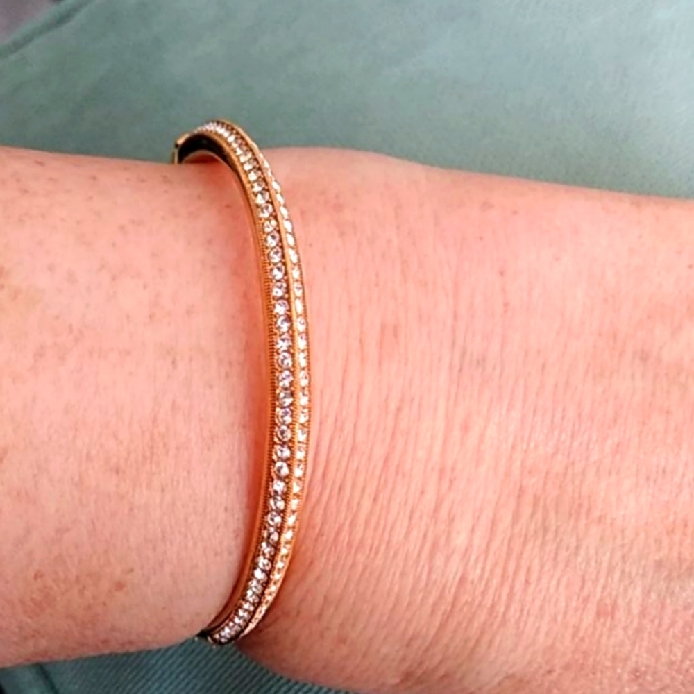 DIAMONDIQUE GOLD TONE METAL BRACELET